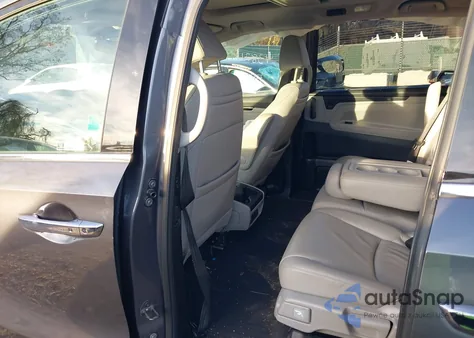 2019 Honda Odyssey Elite z USA, uszkodzony, nr VIN 5FNRL6H98KB093181